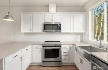 Photos are of a similar home in the community