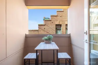 Covered balcony overlooking the historic Firehouse 18.