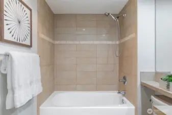 Enjoy a full-sized, spa-inspired bathroom.