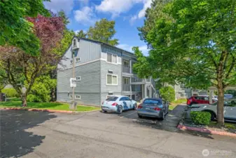 This complex is nestled in a beautiful setting with mature landscaping.