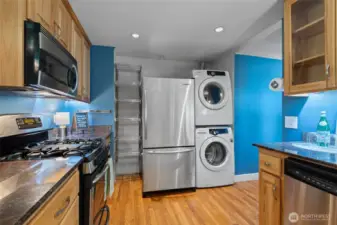 Convenient layout with washer, dryer, and refrigerator all within easy reach—ideal for multitasking and efficient use of space.