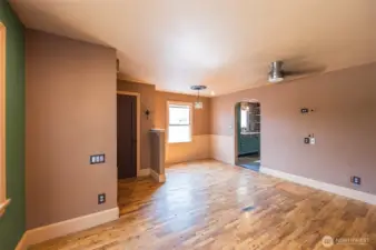 Living room with original hardwoods! All new hardware throughout!