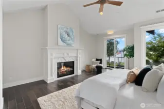 Breathtaking vistas surround the serene primary retreat, where elegant finishes create a perfect sanctuary.