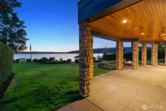 Timeless and gracious, the spacious lawn and covered patio evoke a Cape Cod charm rarely found along Lake Washington.