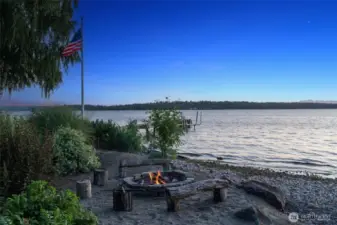 Where the lawn meets the lake, end the day with s’mores by the fire - pure waterfront magic.