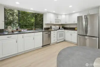 Lots of counterspace and room for an eat in table.`