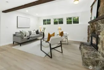 New windows downstairs & brand new flooring.