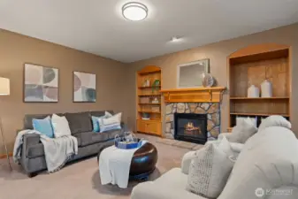 Family room with gas fireplace and custom built-ins.