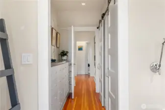 Primary suite includes separate walk-in, spa-like full bath and built in drawers