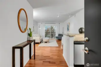 Welcome home. To the left of the door is a spacious coat closet. The kitchen is to your right