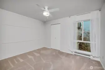 Large bedroom, big enough for a king size bed, dresser/s and more