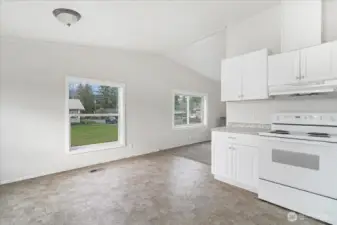 View of kitchen from laundry area.