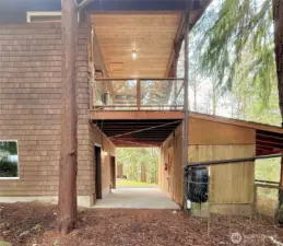 View of barn and storage with family room balcony above.