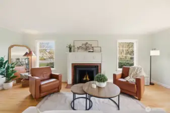 Tall windows and timeless details create an elegant yet cozy space, perfect for entertaining.