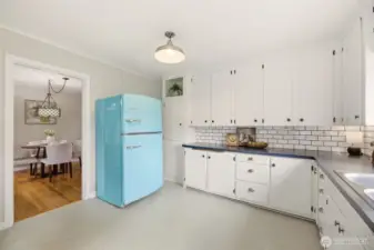 Kitchen offers a seamless blend of vintage charm and modern convenience.