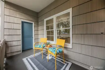 Cozy back porch perfect for relaxing.