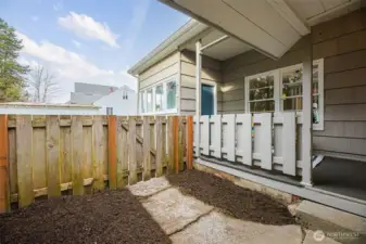 Fully fenced and gated backyard adds convenience and privacy.