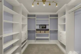 Walk in master closet with custom built ins