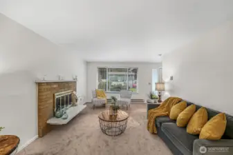 Living area with a cozy wood-burning fireplace