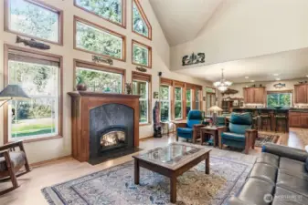 Wall of Windows with a Cozy Gas Fireplace