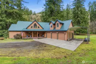 3-car Attached Garage with covered RV Parking