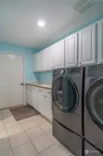 Large Laundry Room with Sink & Storage. Garage Access.