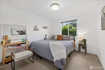 Inviting Primary Bedroom with a Cozy, Relaxed Atmosphere.