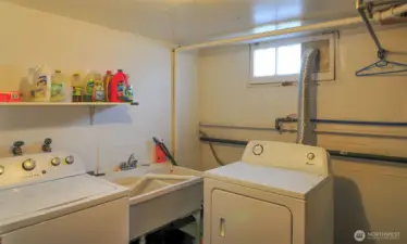 LAUNDRY AREA WITH 3/4 BATHROOM