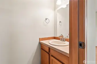 Main floor powder room = a must-have for guests and everyday convenience.