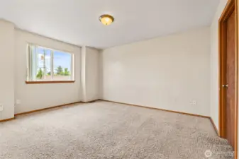 Start and end your day in style with this spacious primary suite featuring an ensuite and walk-in closet.