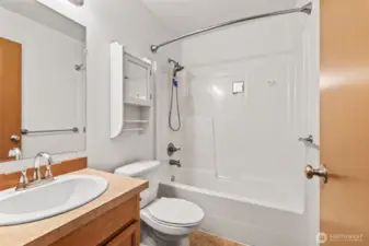 A spacious full bathroom upstairs, designed for convenience and comfort.