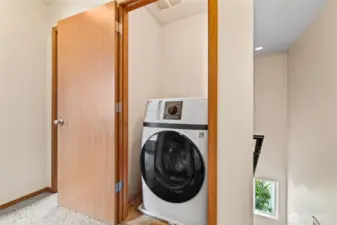 No more hauling laundry up and down — this combo washer/dryer is perfectly placed upstairs.
