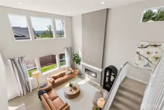 Dreamy living space open to above. Photo's are for representational purposes only. Colors and finishes may differ.