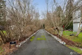 Long driveway at the end of a cul-de-sac.