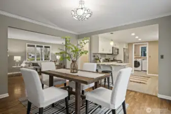 Crown molding and period lighting adding to the home's character.