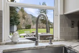 Enjoy breathtaking Mt. Si views from the kitchen and many other rooms in the home.