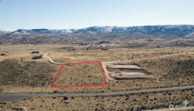 Lot Looking East. Road Showing In Front Is Spring Canyon Campground Road Which Leads A Mile Down The Road To Spring Canyon Park & Boat Launch. Views Everywhere.