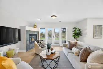 Lower level family room w/ gas fireplace, patio access