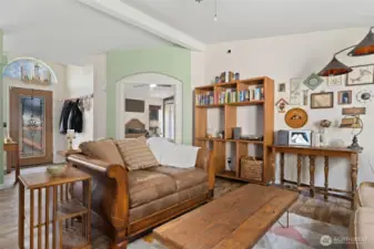 Living Room backs up to the formal entry foyer.