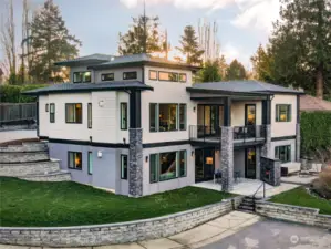Hardy Siding, Stacked Stone Details, 50 year Presidential Shingles, Irrigation System, Outdoor Patio Speakers in the Back, Gutter System Attached to Short Plat Storm Drainage System, Clear Cedar Soffits, etc.