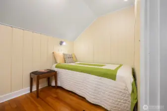Second half of third bedroom fits a twin-size bed or nursery