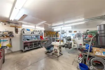 Insulated two-car garage with extra shop area