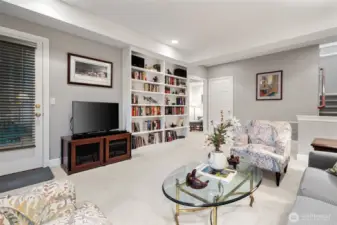 Lower level family room with access to the back yard and patio.