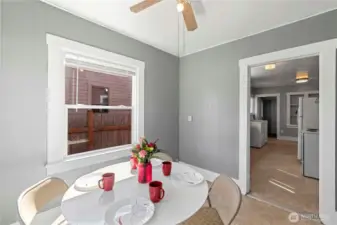 The dining room is conveniently located next to the kitchen