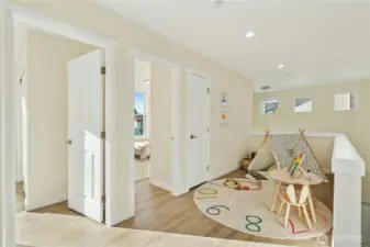 Upstairs loft area with linen closet
