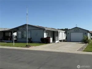 Three bedroom 2 bath home with a garage in a premiere 55+ community.