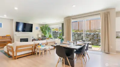 The living and dining rooms connect seamlesslessly which, in turn, give access to the private back yard through a huge sliding glass door. The yard's lush grass and large aggregate patio invite you to spend time outside!