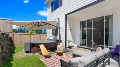 This backyard oasis offers incredible privacy and a retreat-like setting.