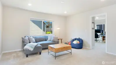 Upstairs, this loft is so spacious! Perfect for pause or play, reading a good book, or just for separation from the downstairs.