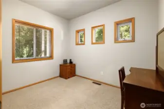 Versatile flex space ideal as an office or an extra bedroom located on the main floor.